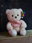 Мишка розовый в клетчатом слюнявчике 